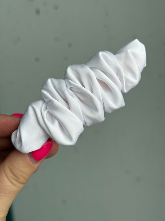 Baltas segtukas raukinukas