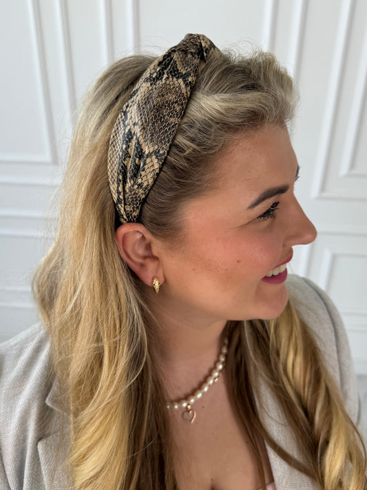 Rudas gyvatės rašto eko odos mazgelis 🐍