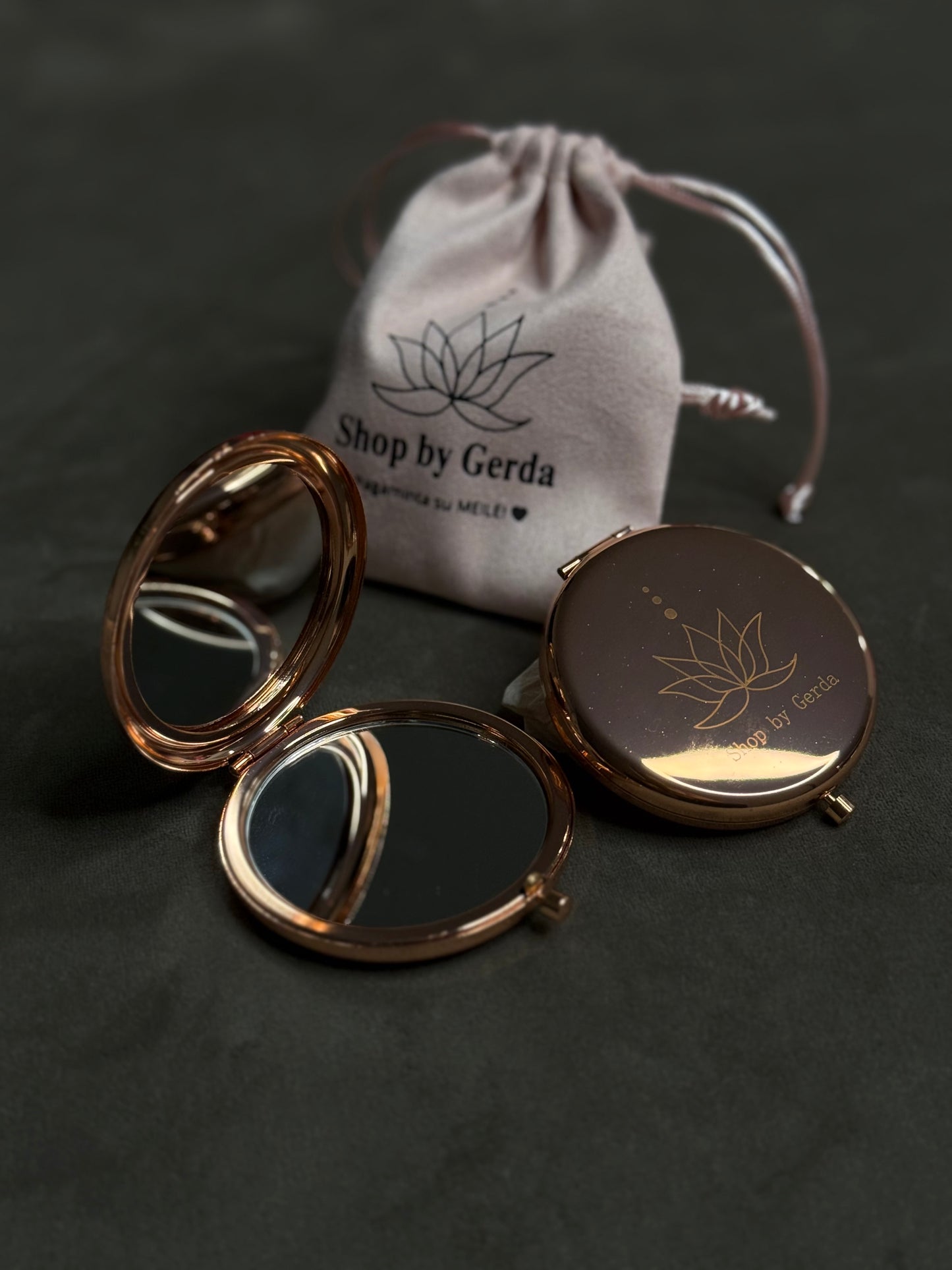 Rožinis metalinis veidrodėlis