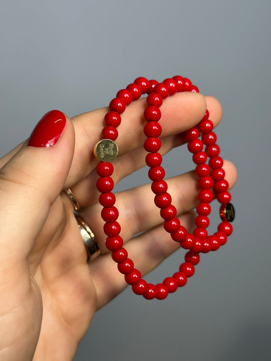 Raudona stiklinių perlų apyrankė