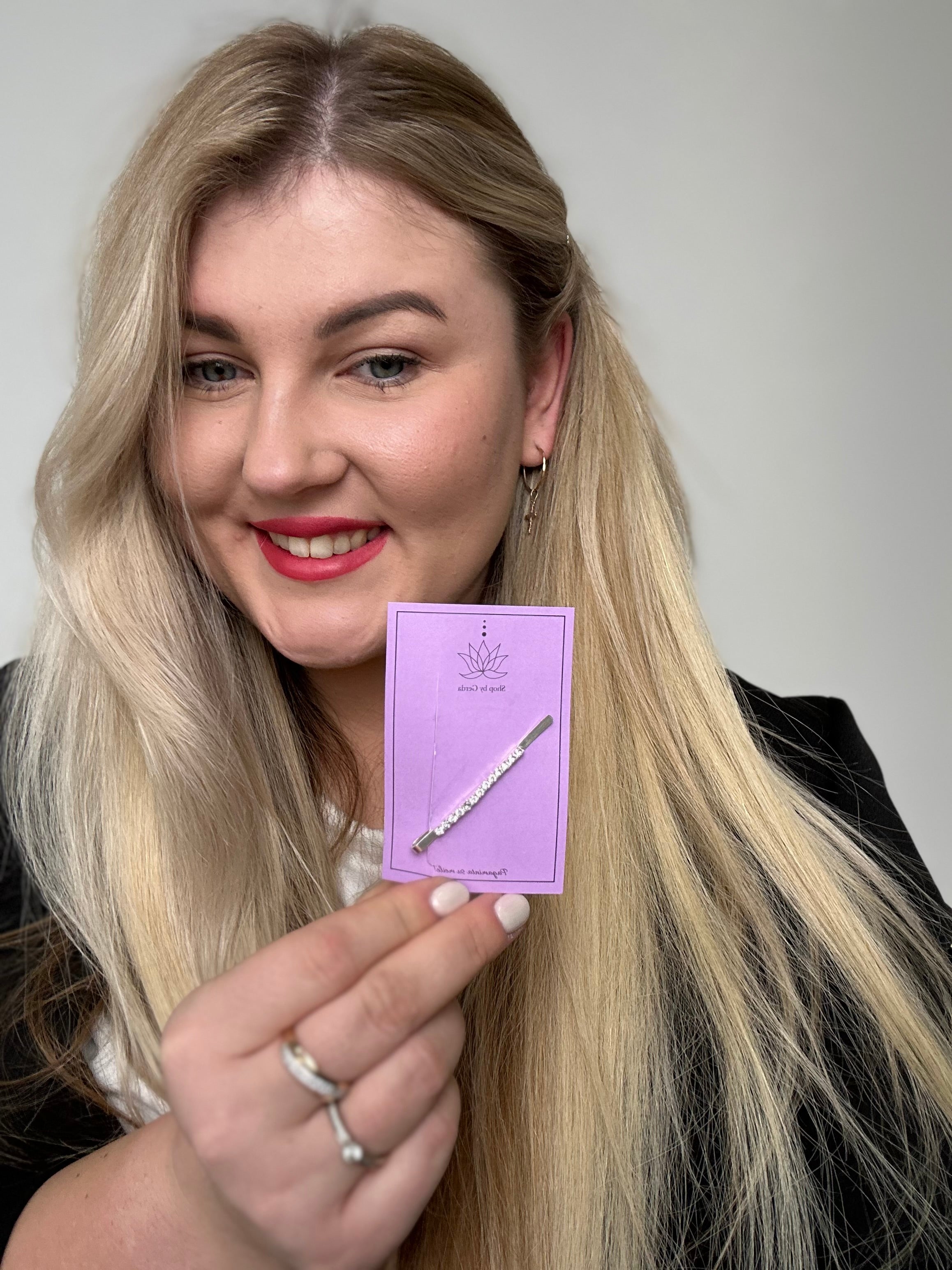 Sidabro spalvos žėrintis segtukas