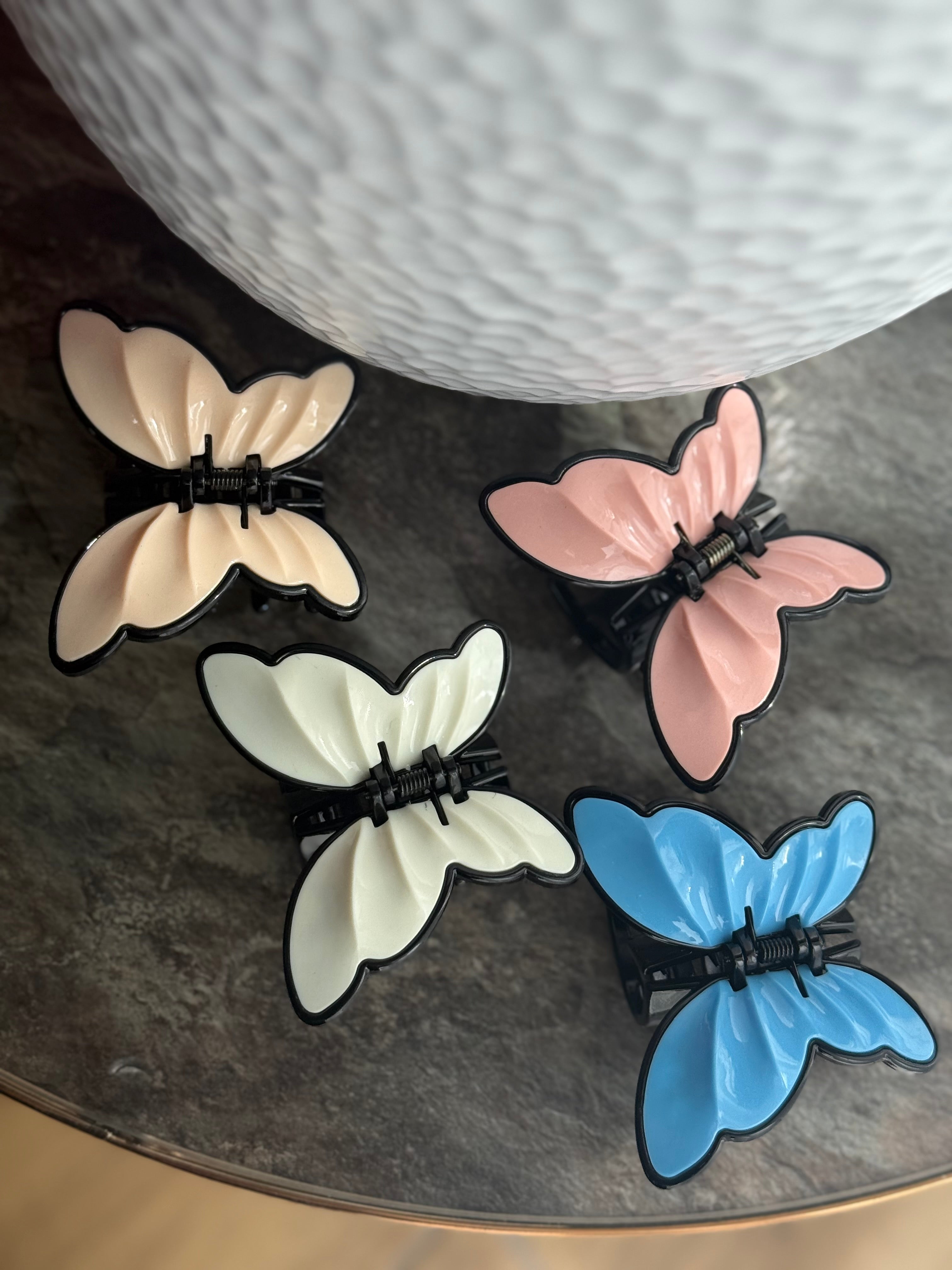 Rožinis drugelis kapkap