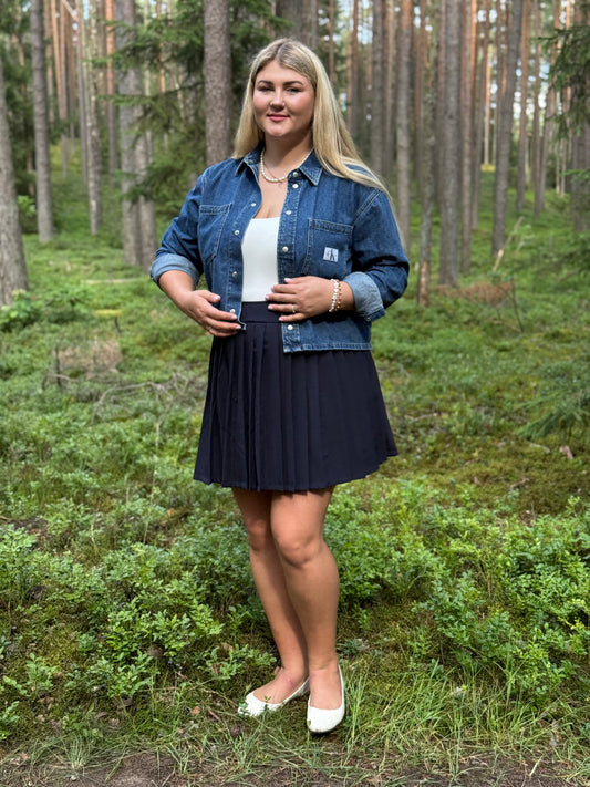 Tamsiai mėlynas klostuotas sijonas su kišenėmis